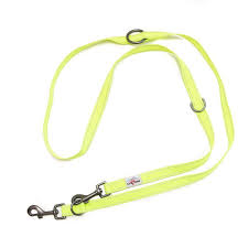 Yellow dog leash with clip on a white background